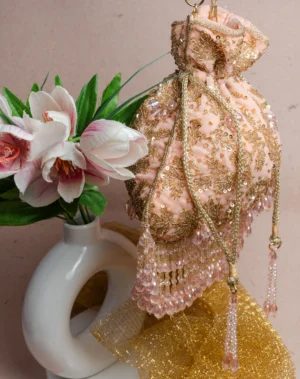 Blush Pink Leaf Beaded Potli Bag with Crystal Fringe and Gold Embellishment