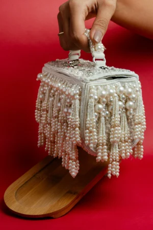 Velvet Base Box Clutch with Elegant Pearl Tassel Detailing