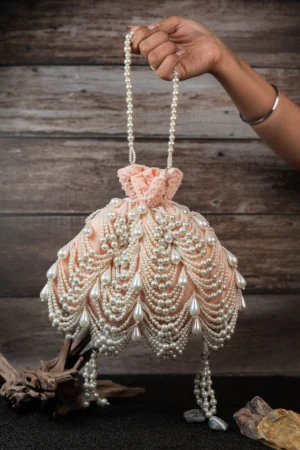 Blush Pink Pearl Velvet Potli Bag with Layered Pearls and Tassel Drawstring
