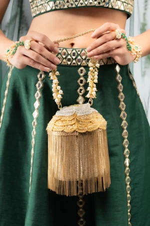 Luxe Gold Potli with Metallic Tassel Embellishments and Drawstring Detail