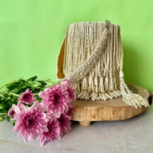 Ivory Suede Potli with Pearl Tassels and Elegant Drawstring Detail