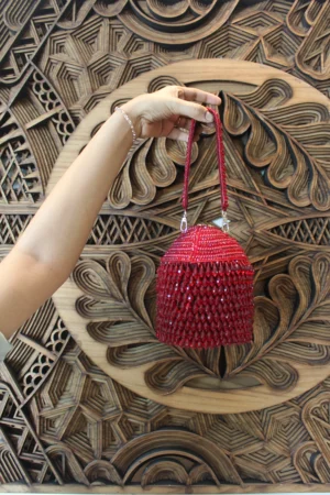 Maroon Crystal Embellished Potli with Tassels and Decorative Lock Detail
